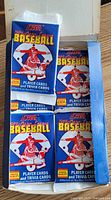 Open box showing sealed packs
