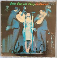 Front cover showing title and concert photo