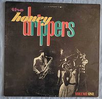 Front album cover showing title and band photo