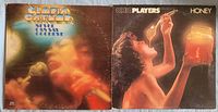 Front covers of both LPs