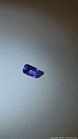 Emerald-cut Tanzanite loose stone front view