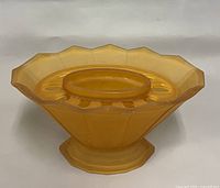 Top view of amber glass Wyndham vase showing circular frog insert with holes