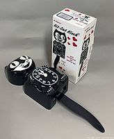 Clock body, detached tail, and box