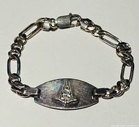 Full view of sterling silver medical alert bracelet on white background