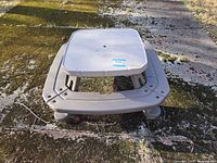 Full view of table front perspective showing benches