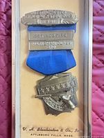 Blue ribbon '.22 Timed Fire – Marksmanship Class 3rd' medal in original box