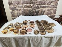Group view of entire lot showing casseroles, saucepans and numerous lids