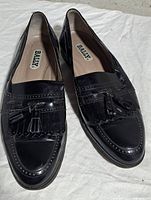 Top view of both Bally loafers showing tassels, fringe and condition