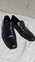 Top view of both loafers showing uppers and toe shape