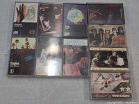 All ten cassette tapes laid out in two rows