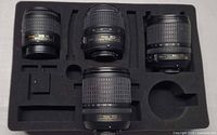 Four Nikon DX lenses in foam insert
