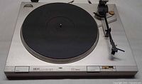 Top view of Akai AP-D210 turntable showing platter, tonearm and controls