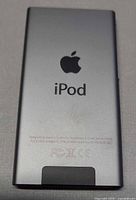 Rear view of space gray iPod nano showing Apple logo and capacity text