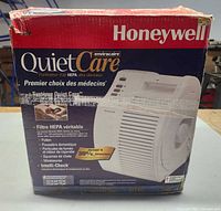 Front of retail box showing Honeywell QuietCare Ultra Quiet HEPA Air Cleaner