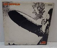 Front sleeve with airship artwork and Led Zeppelin text