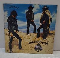 Front sleeve showing Motörhead Ace of Spades cover art