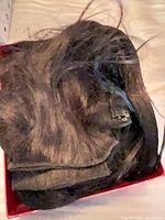 Extension wefts stacked in box showing colour and clips