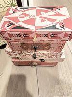 Stacked pink patterned multi-drawer jewelry organizer chest