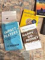 Group shot of all six new business and personal finance books