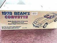 Box top showing graphics and wording 1978 Beam's Corvette Beam Regal China Decanters