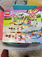 Instruction booklet showing LEGO Friends Heartlake City Pool set 41008