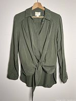 Full front view of olive green Maeve shirt showing front tie design