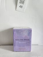 Front of sealed Celine Dion Belong 50 ml fragrance carton