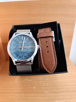 Watch in box with extra leather strap