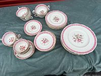 Group shot of Cauldon china set showing cups, saucers and plates