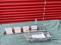 All three items: Eurofase vanity light, sealed shower shelf, toilet paper holder