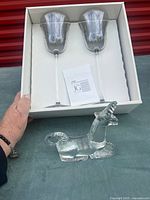 Box with two Jazz wine glasses and separate clear glass unicorn figurine
