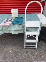 Full lot showing ladder, planter, drill bit case, sealed LED lights