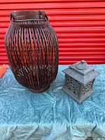 Both lanterns side by side on surface