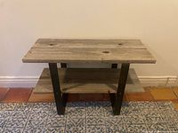 Front overview of console table showing both tiers and steel legs