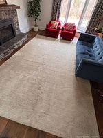 Full view of Surya wool rug in living room setting