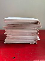Stack of bubble mailers showing quantity and uniform condition