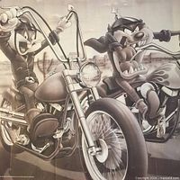 Full poster graphic showing Bugs Bunny and Taz on motorcycles