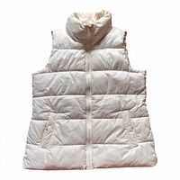 Front view of cream Old Navy puffer vest showing zipper, collar and pockets