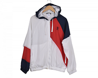 Front view of Reebok Classic windbreaker showing color-block design and hood