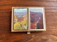 Open box with two decks showing scenic backs