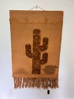 Full view of burlap cactus wall tapestry