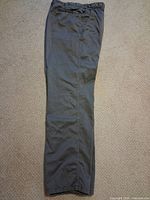 Full view of grey Armani Collezioni pants