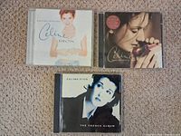 Front covers of all three Celine Dion CD albums