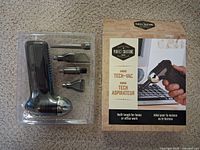 Box front showing brand Perfect Solutions Mini Tech-Vac, vacuum image and text