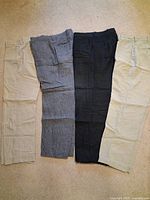 Four pairs of pants laid flat showing colors and length