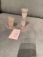 Both crystal candle holders side by side