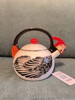 Full side view of rooster tea kettle