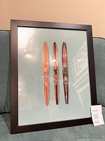 Front view of framed water ski print upright