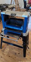 Front view of Mastercraft benchtop thickness planer on stand