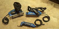 All three Mastercraft corded power tools laid out with cords visible